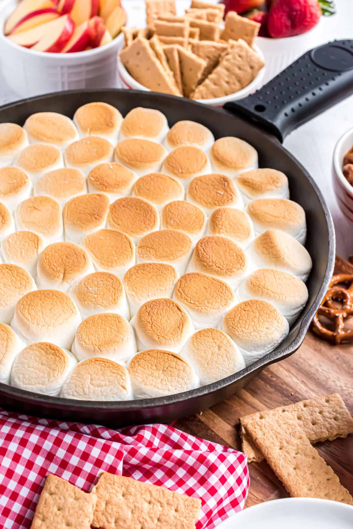 Smores dip; served in cast iron skillet with graham crackers for dipping.