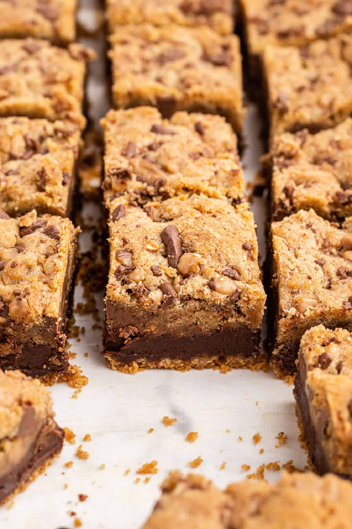 Toffee chocolate chip layered cookie bars cut into squares.