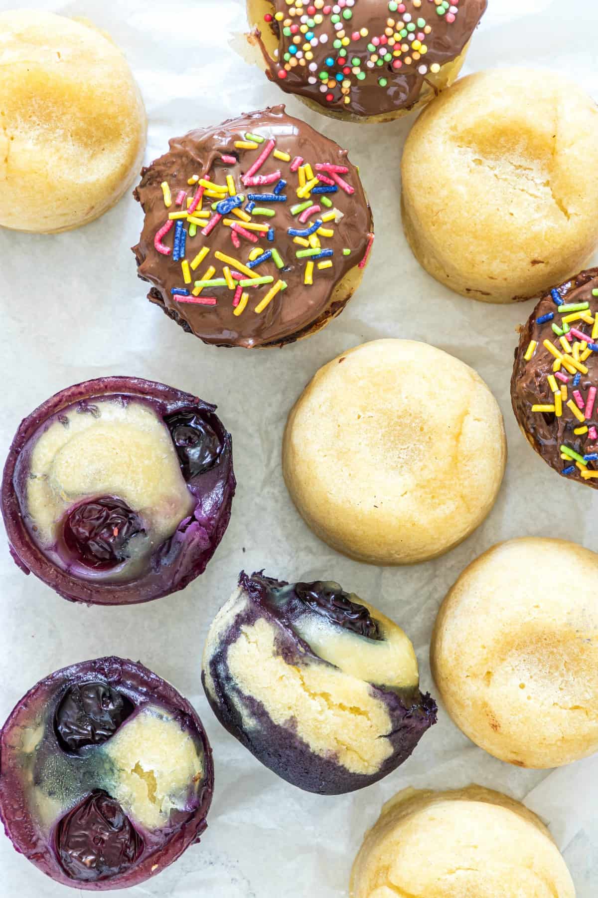 Pancake bites made in the instant pot, some plain, some with blueberries, and some topped with nutella and sprinkles.