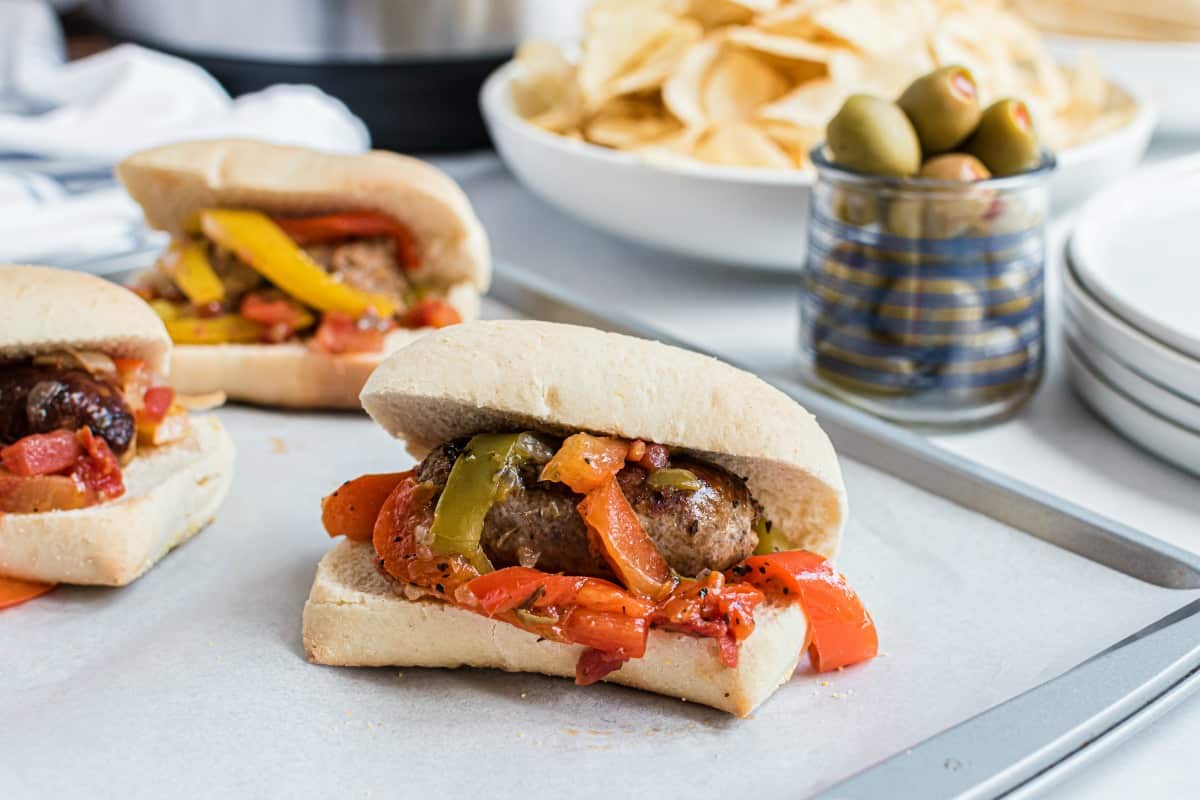 Sausage and peppers cooked in a pressure cooker and served on french rolls.