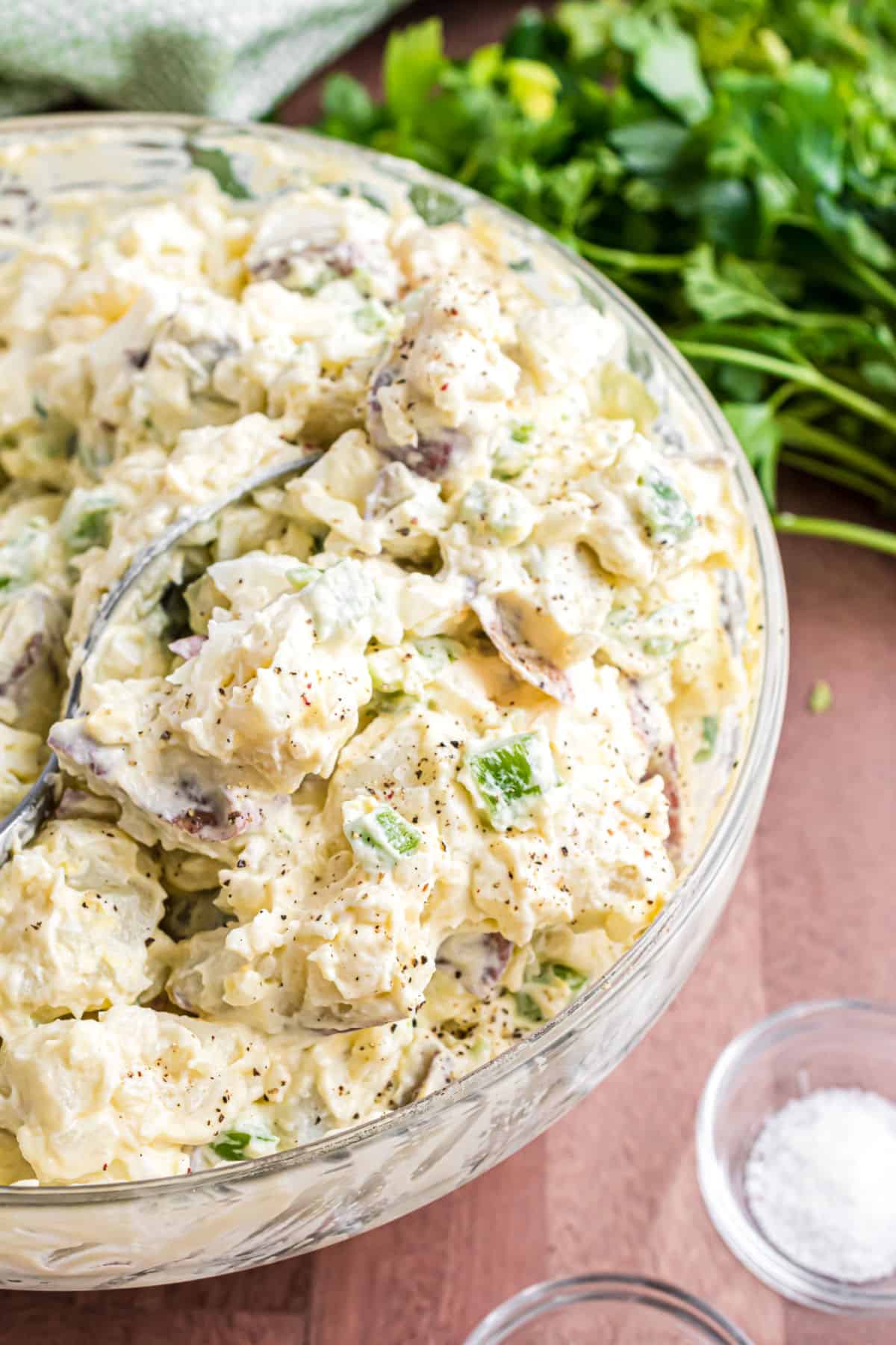 Potato salad with eggs and mayonnaise in a bowl to serve.