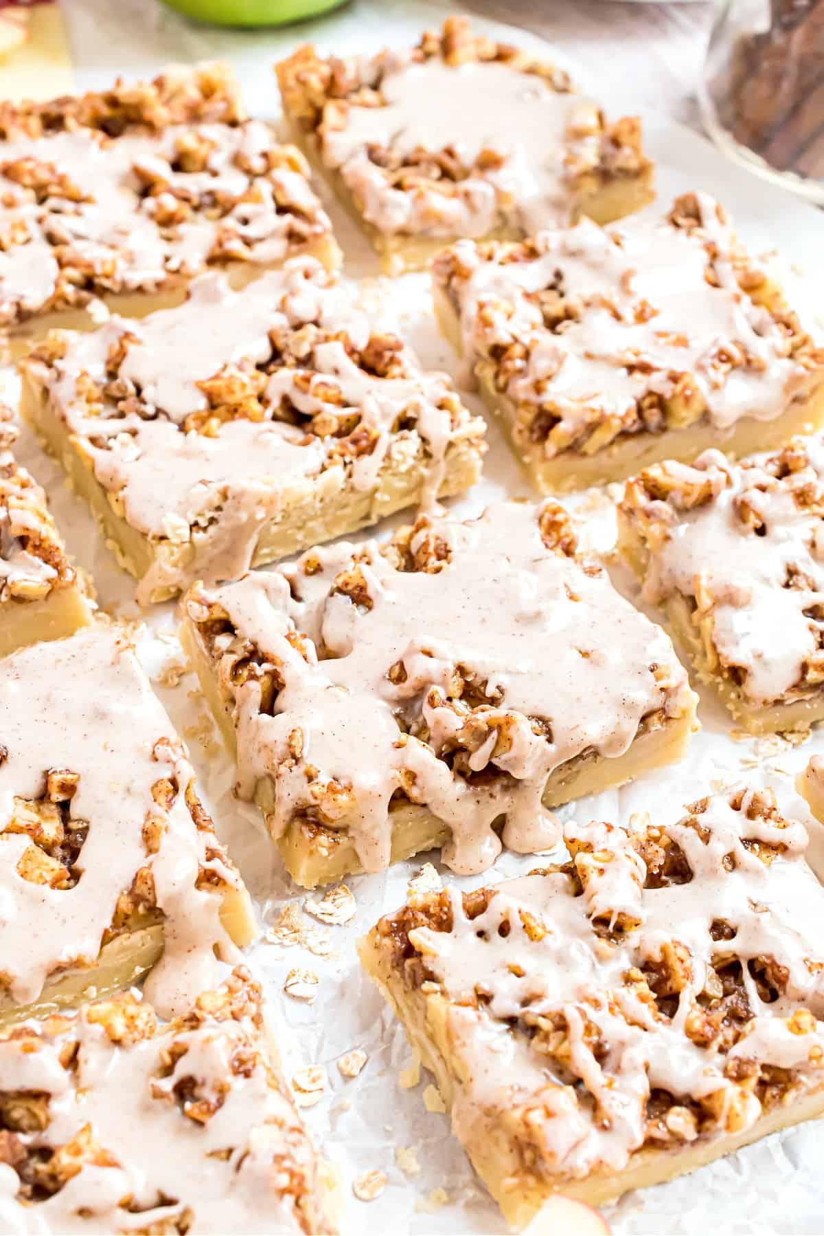 Apple topped shortbread cookies cut into bars.