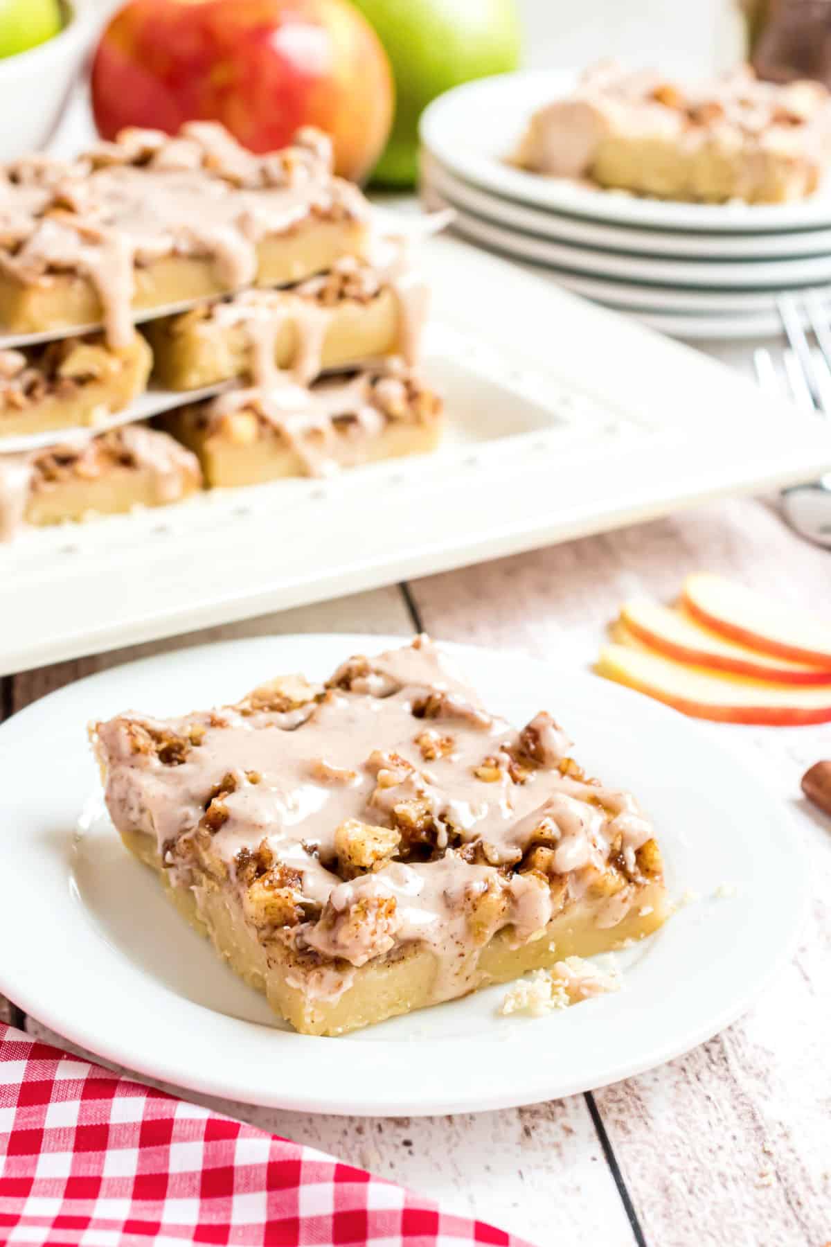 Shortbread bar with apple topping and cinnamon icing.