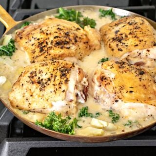 baked chicken thighs in a skillet