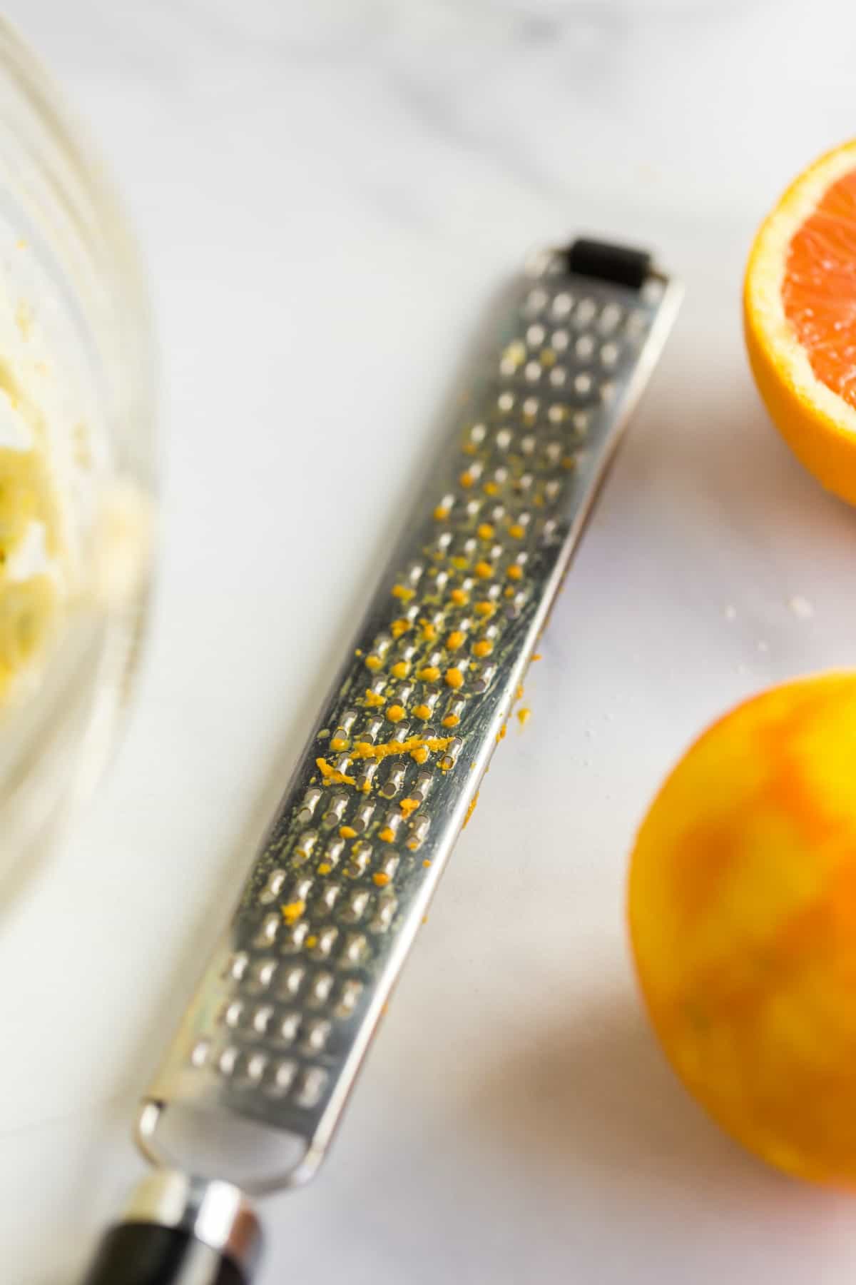 Microplane zester with cara cara orange.