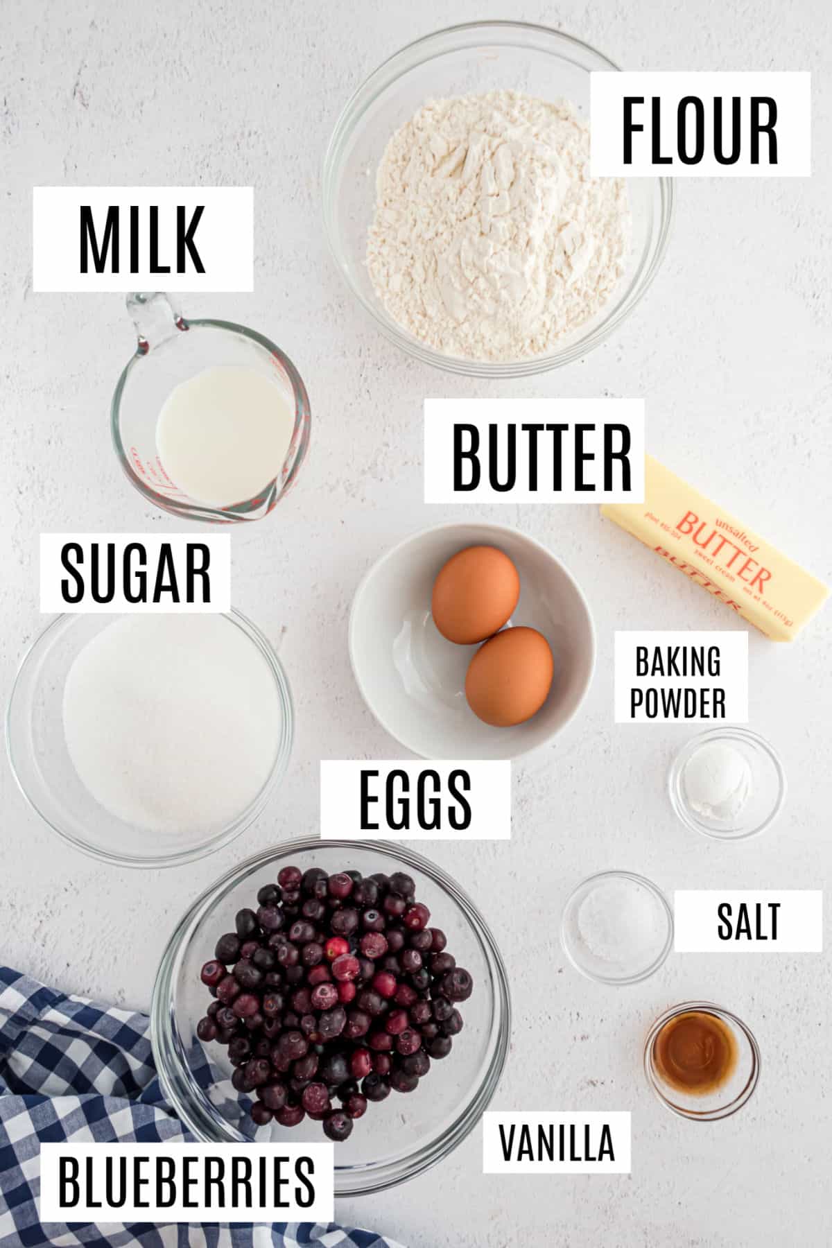 Ingredients needed to make blueberry muffins.