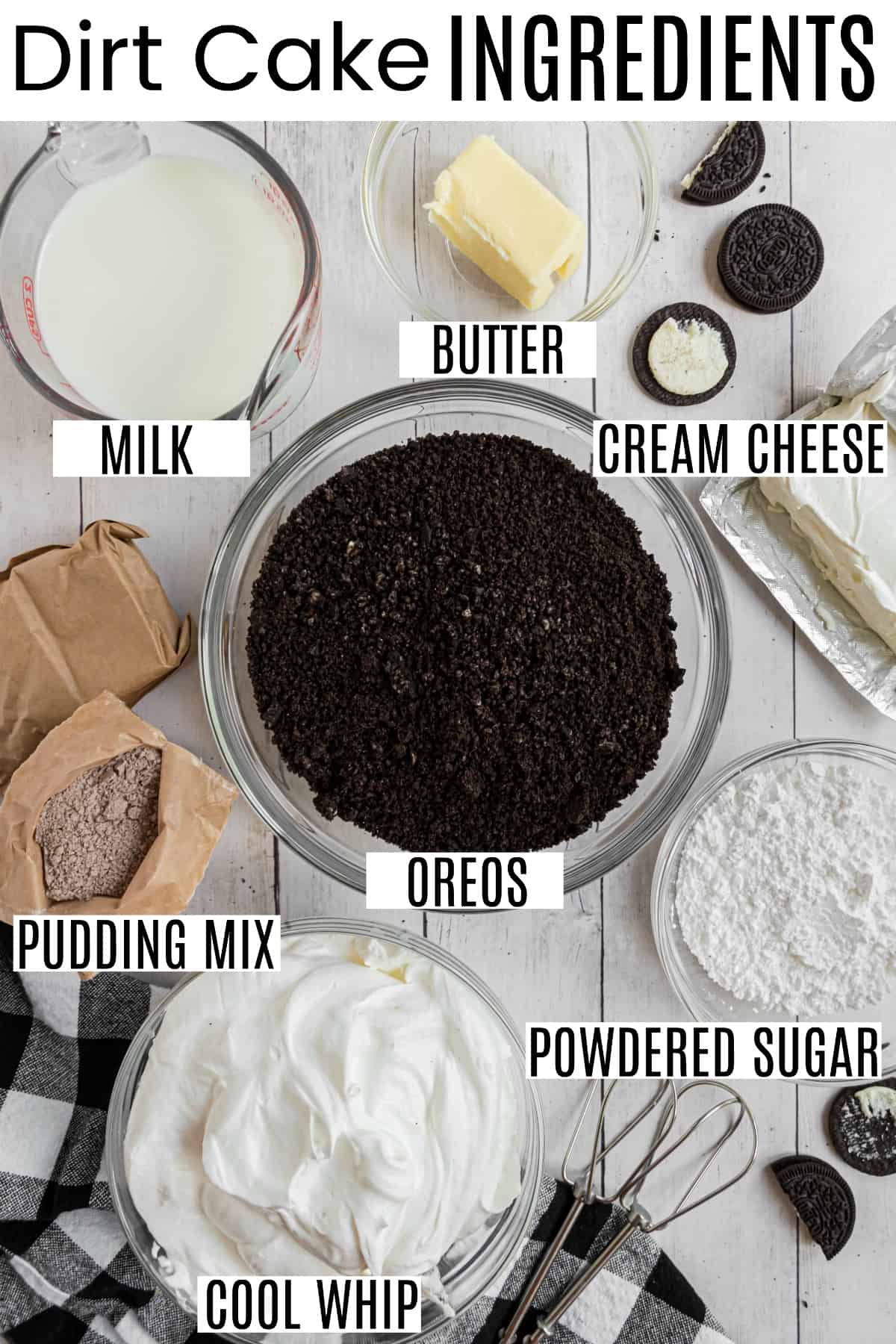 Dirt cake ingredients in small glass bowls, including oreos, pudding, and cool whip.