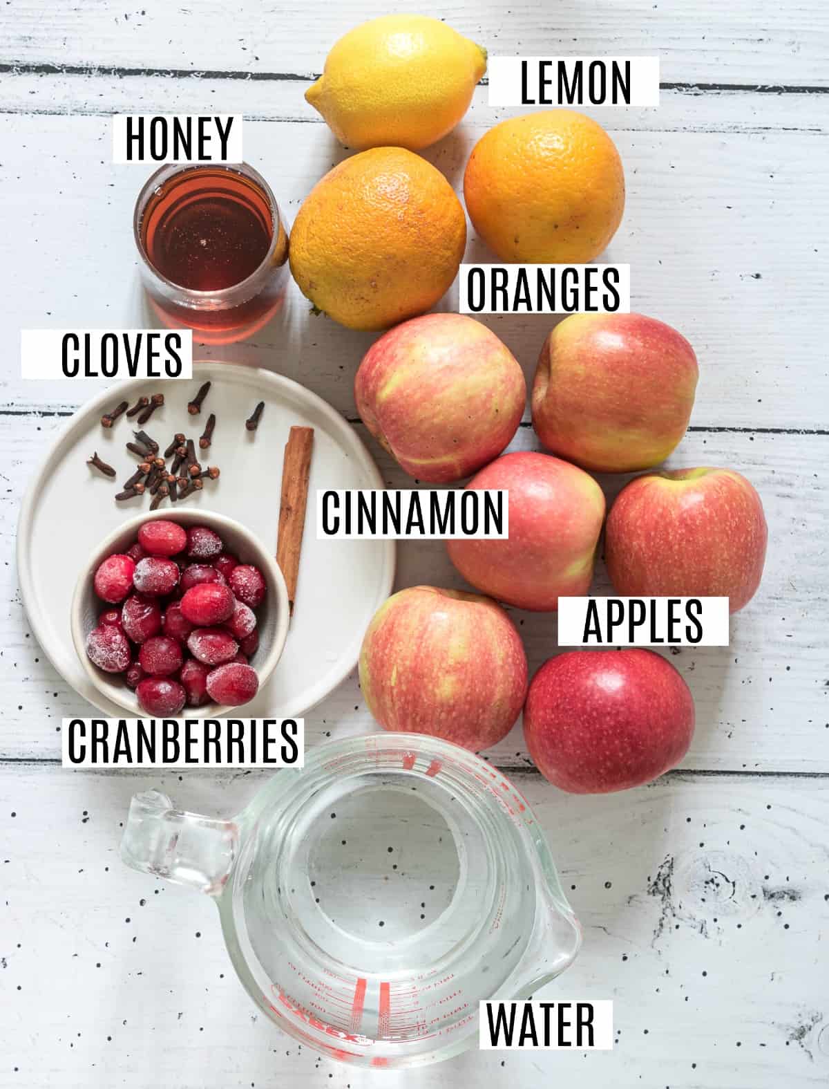 Ingredients needed to make homemade apple cider.