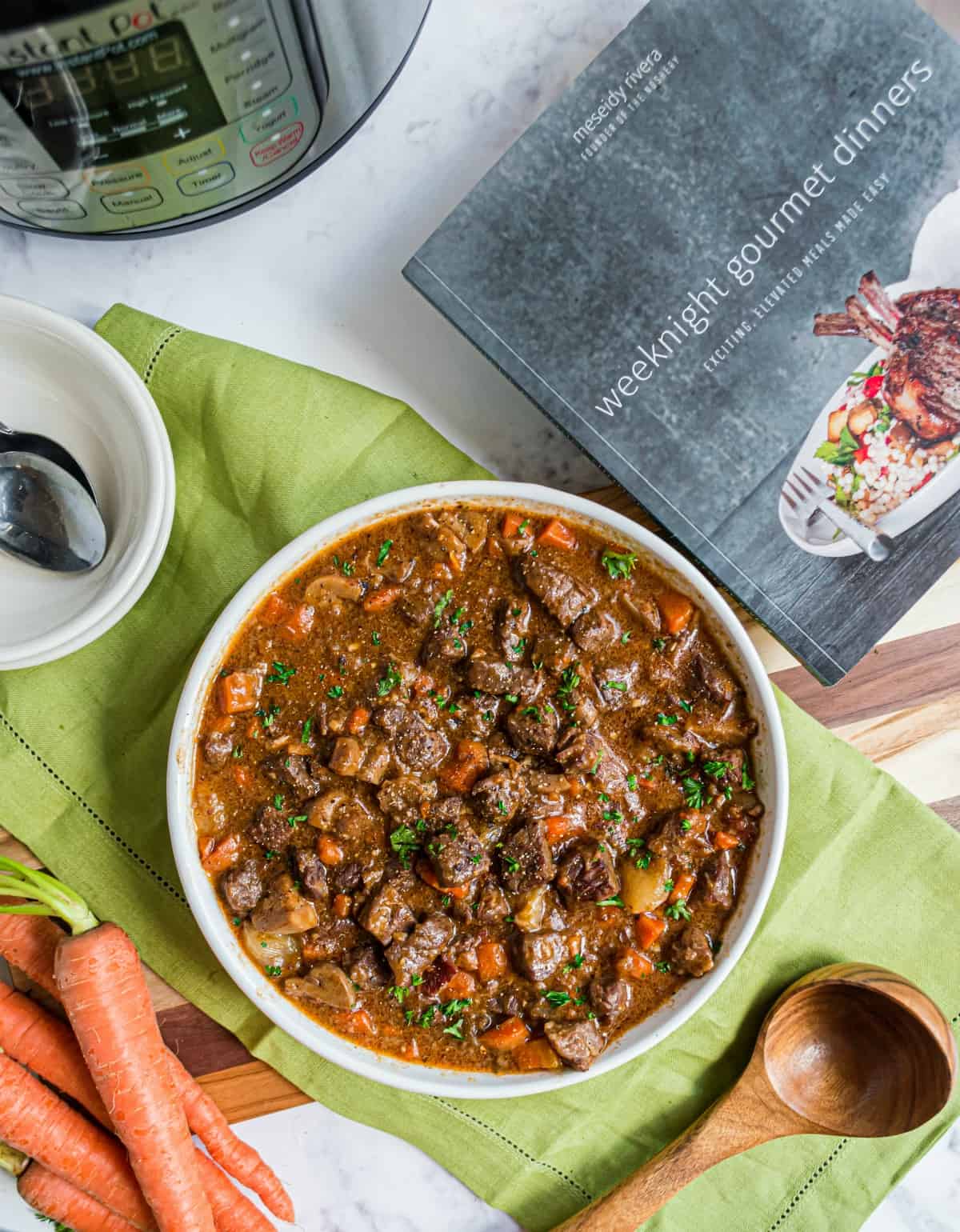 Beef stew in a serving bowl.