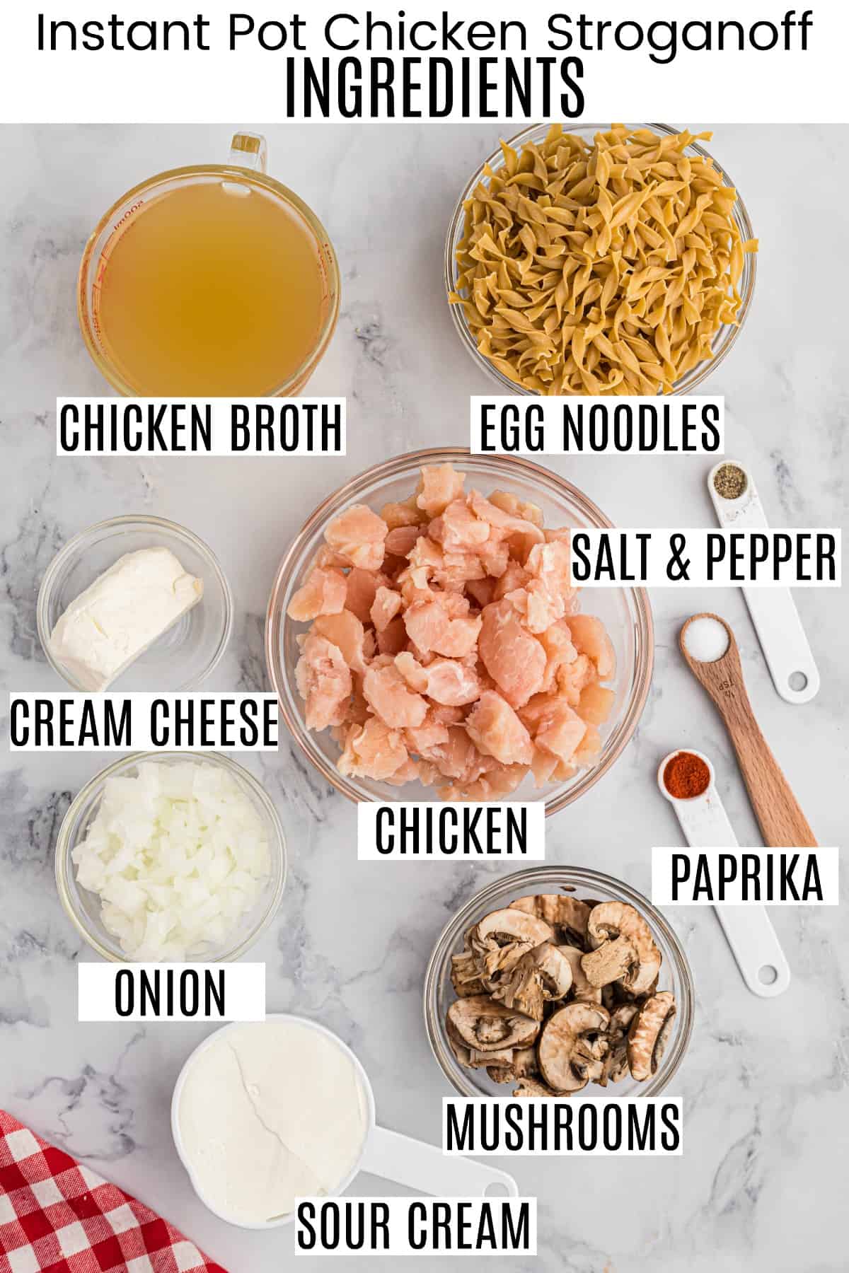 Ingredients for chicken stroganoff in a small bowls on counter.