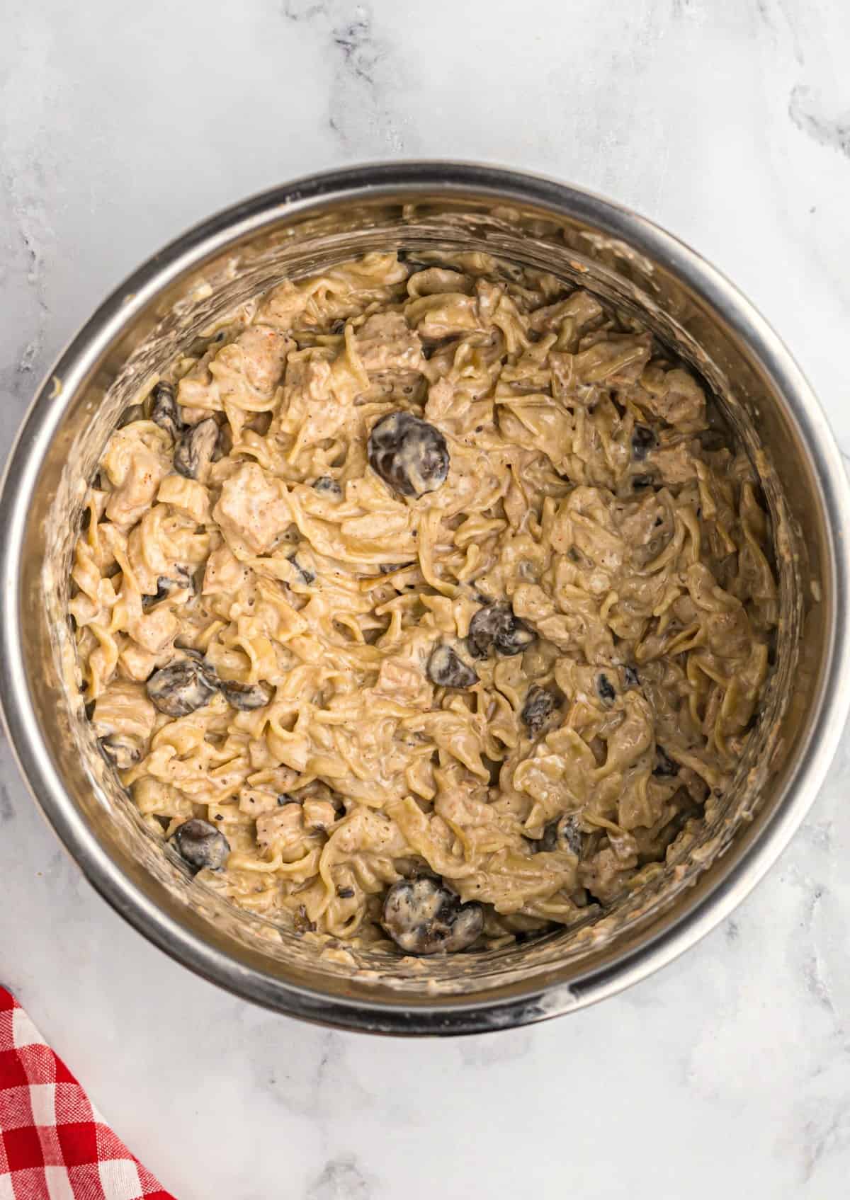 Chicken stroganoff in the pressure cooker pot.