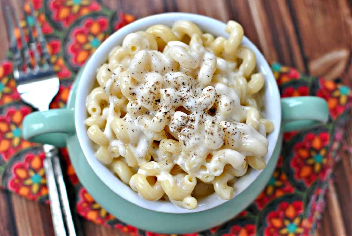 Panera mac and cheese served in a green bowl.