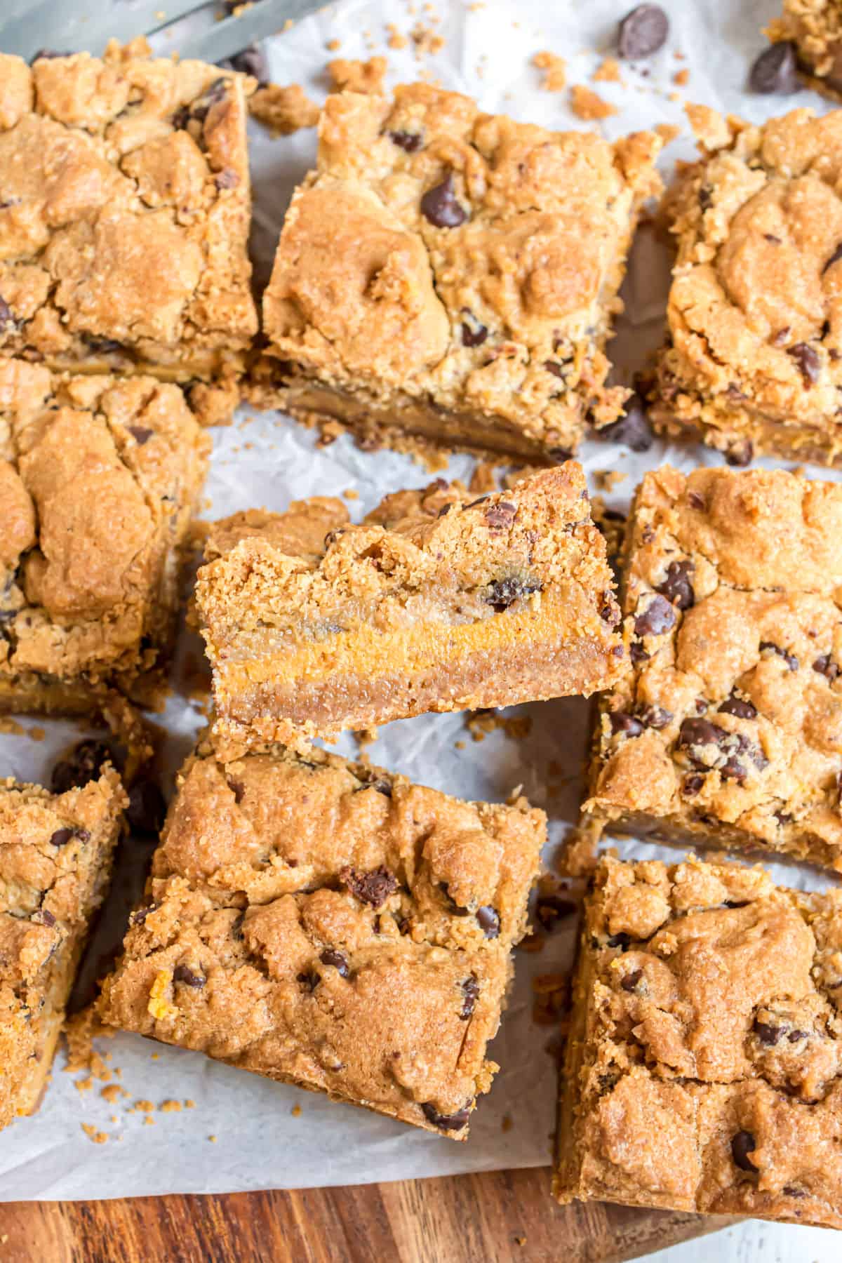 Pumpin cheesecake cookie bars cut into squares.