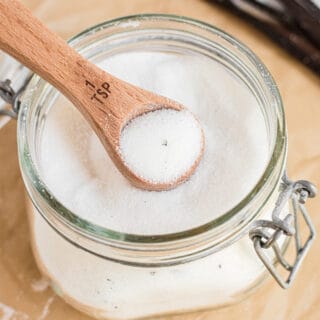 Homemade vanilla sugar in a mason jar.