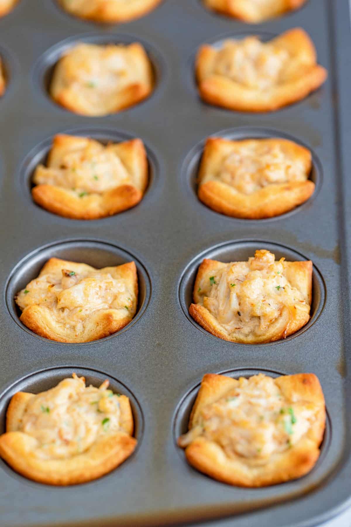 Crab puffs baked in a muffin tin.