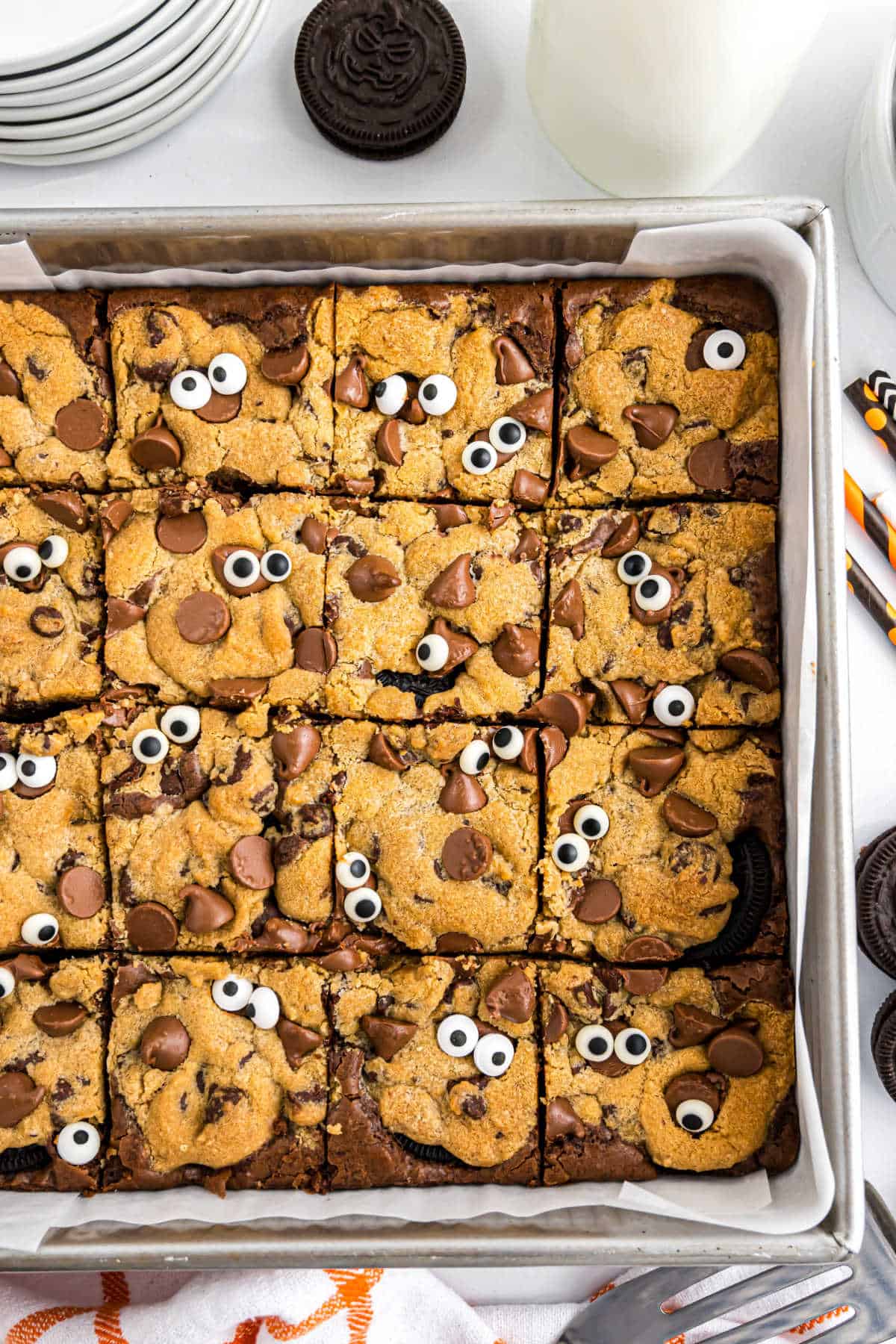 A tray of spooky brookies with googly eyes adds a fun and eerie twist to your dessert table.