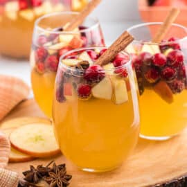 This Apple Cider Sangria is perfect for sipping in the fall or for sharing during the holidays. A pitcher of this bubbly sangria made with cider, wine, brandy and Prosecco brings instant cheer to the table!