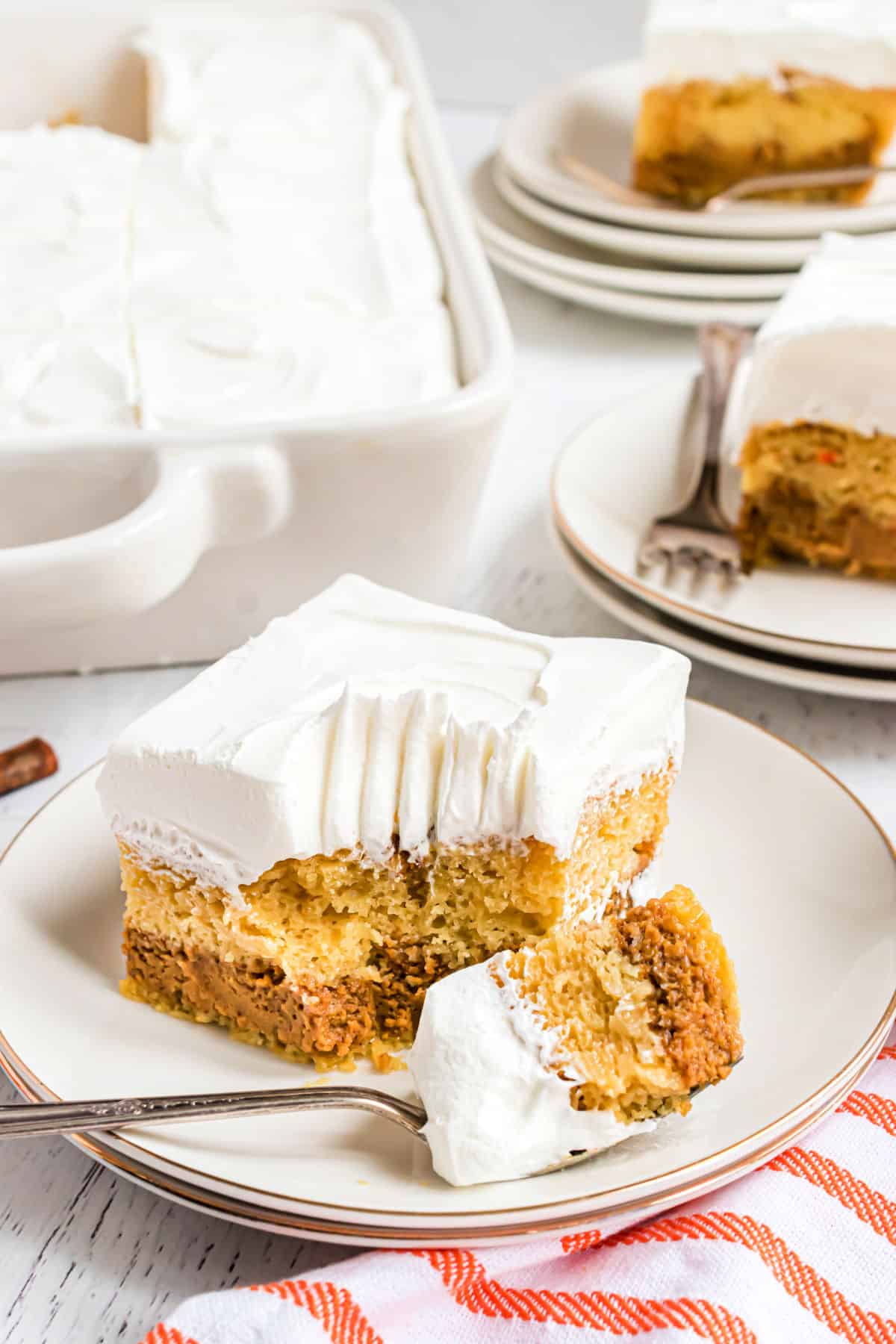 Pumpkin magic cake with a bite taken out.