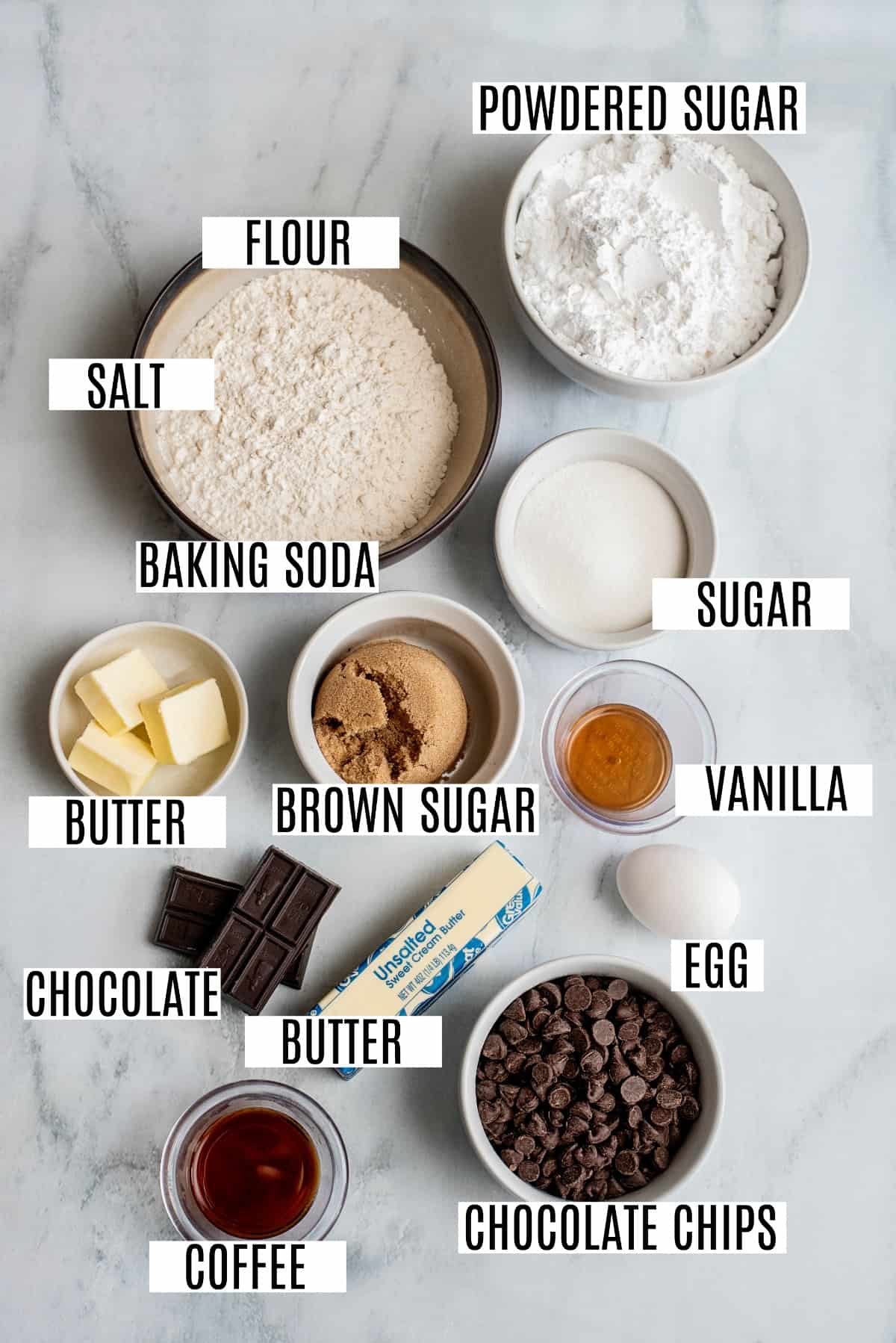 Ingredients needed to make chocolate chip sandwich cookies, including chocolate chips and butter.