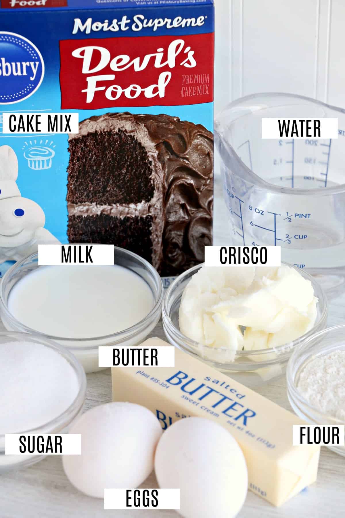 Ingredients to make chocolate whoopie pies including boxed cake mix.