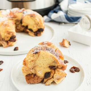 Learn to make Bread Pudding in the instant pot! Sweet bites of bread spiced with cinnamon and nutmeg and flecked with raisins, this dessert is simple, comforting and oh-so-delicious.