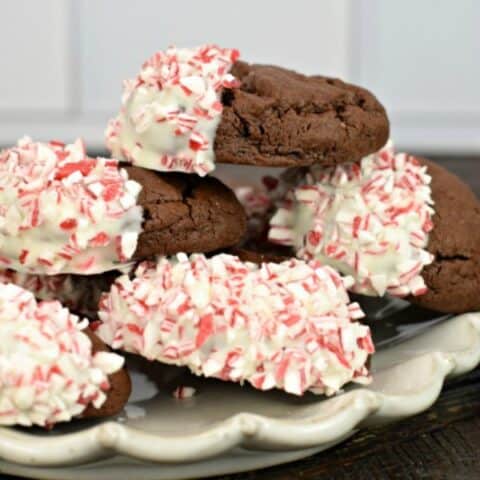 Guaranteed to bring holiday cheer to your taste buds, Chocolate Cookies with peppermint topping are a festive addition to your Christmas Cookie trays!