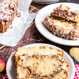 Apple cinnamon bread slices served on white plates.