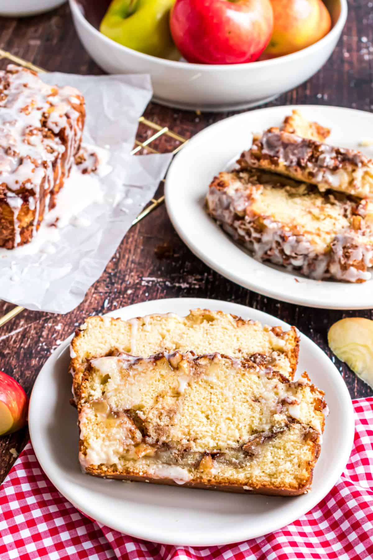 Apple cinnamon bread slices served on white plates.