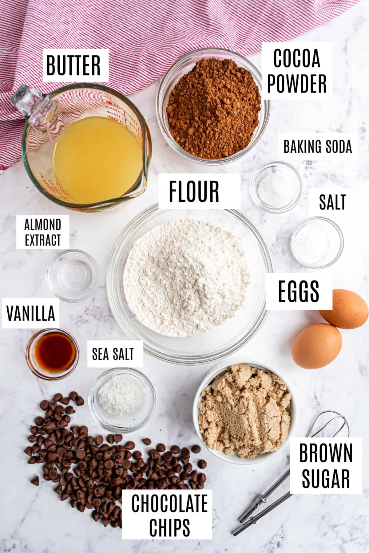 Ingredients needed to make chocolate chocolate chip cookies.