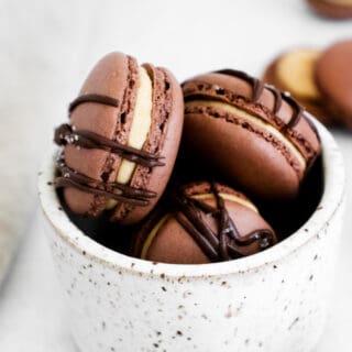 The delicate French meringue cookie made even more indulgent with the addition of chocolate. Chocolate Macarons spread with peanut butter buttercream are a little bite of Parisian heaven!