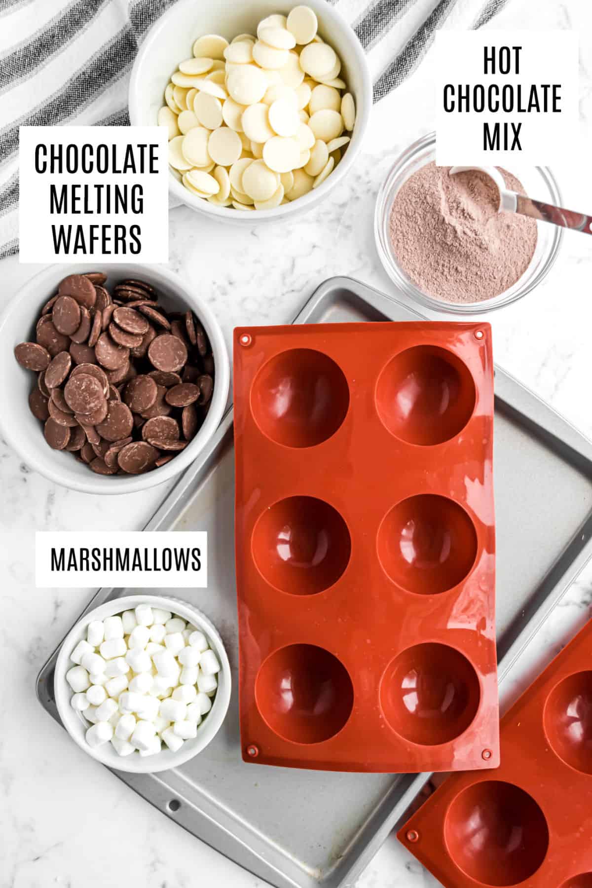 Ingredients needed to make hot chocolate bombs.