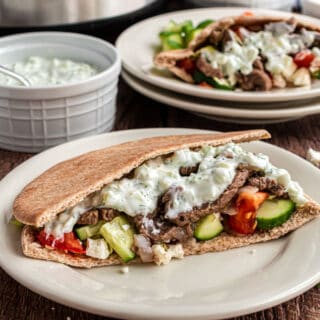 Now you can make those tender beef pitas from your favorite Mediterranean restaurant at home! Instant Pot Gyros are flavored with herbs and drizzled with creamy yogurt sauce that everyone finds irresistible.