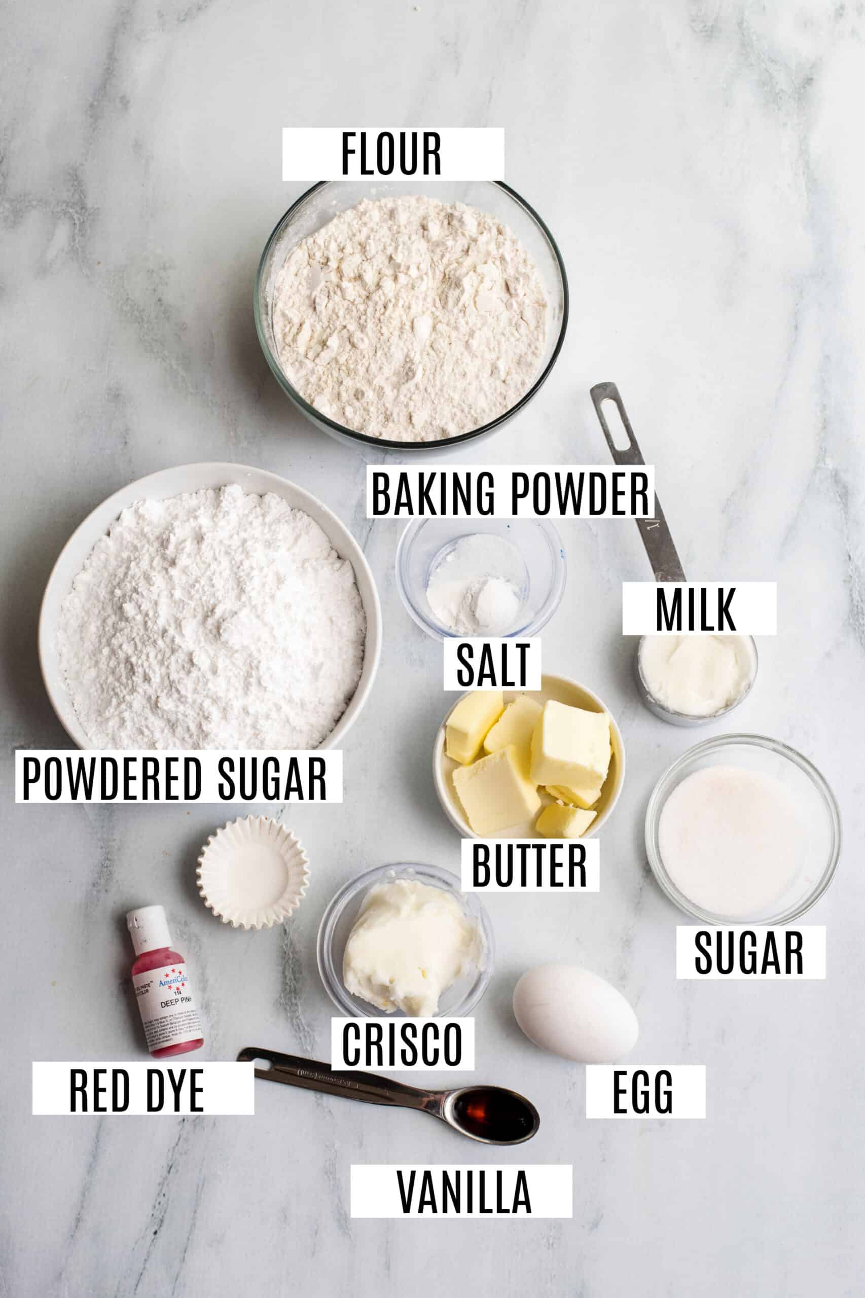 Ingredients needed for pink frosted sugar cookies.