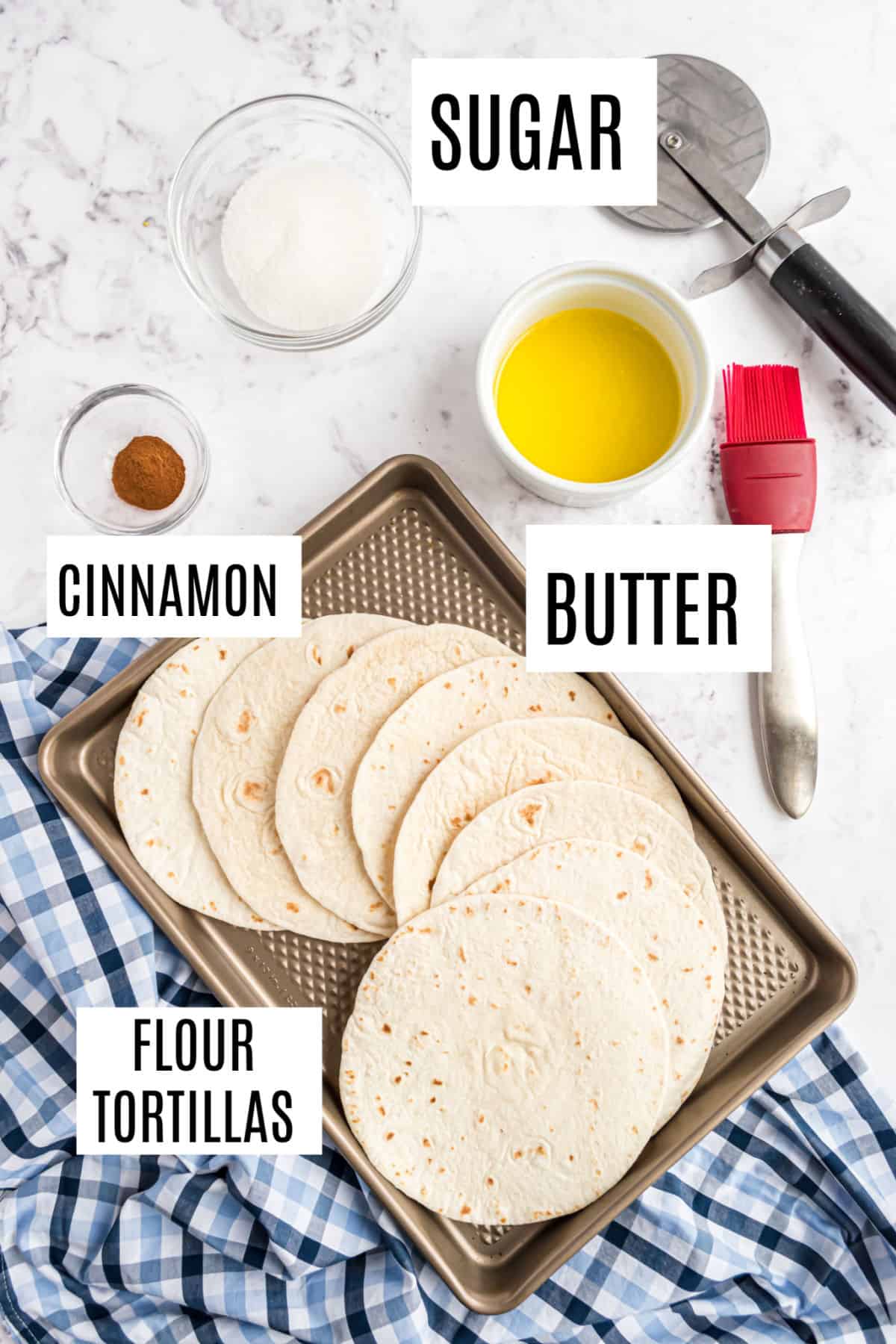 Ingredients needed to make homemade cinnamon sugar tortilla chips.