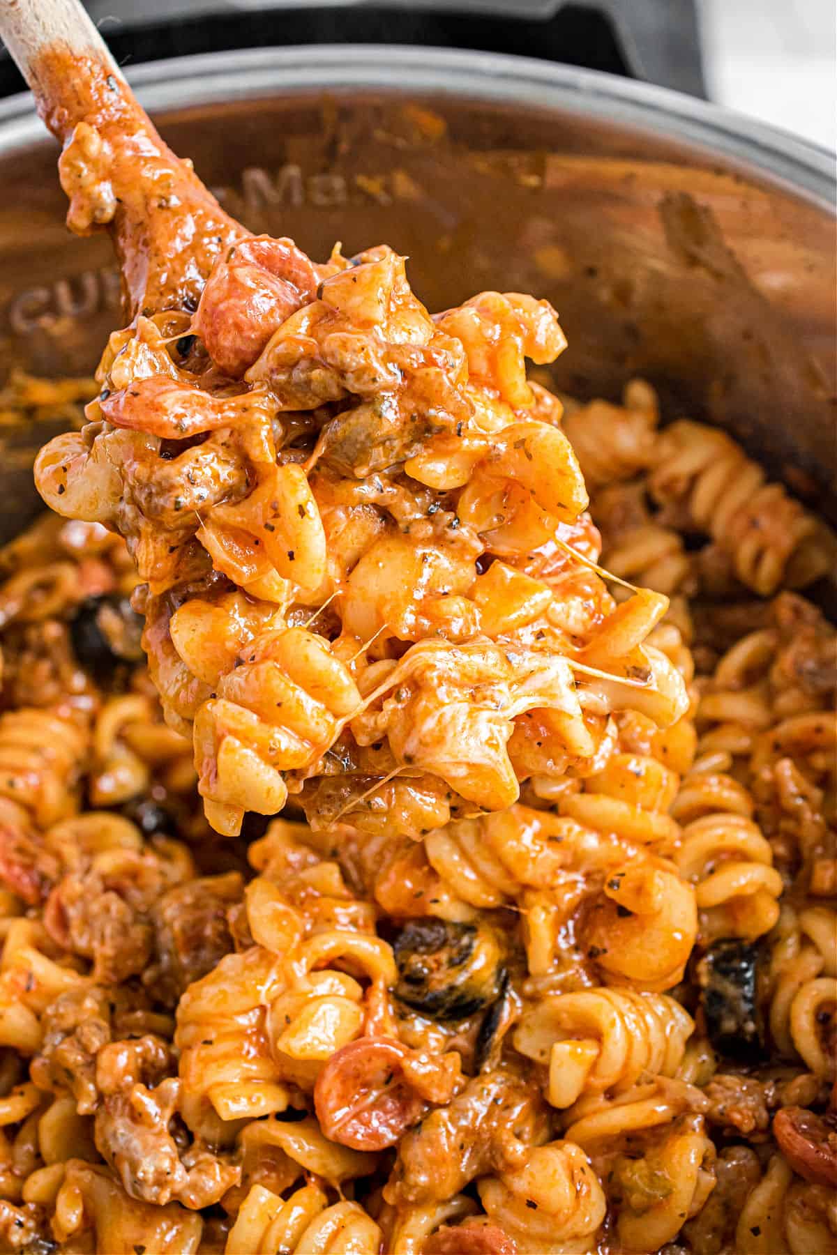 Cheesy pizza pasta casserole in the Instant Pot.