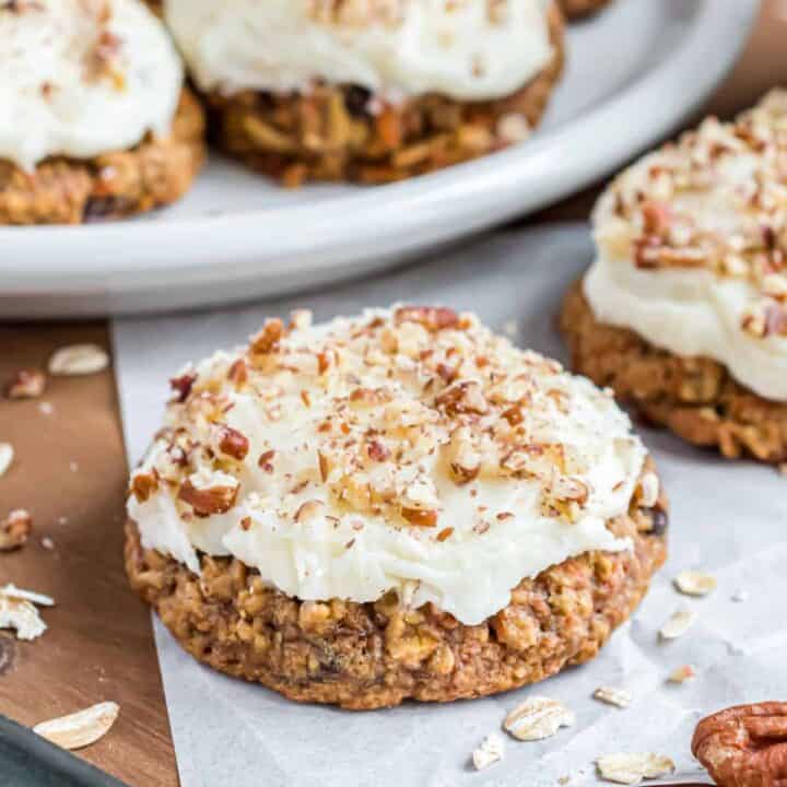 Carrot cake oatmeal cookie with cream cheese icing and pecans.