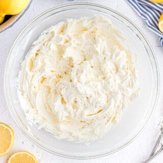 Lemon frosting in a clear glass bowl.