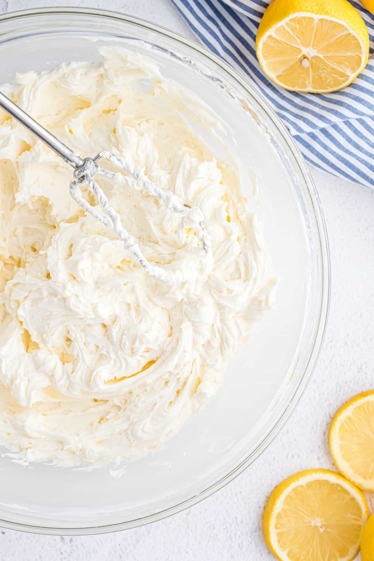 Lemon buttercream frosting whipped to a fluffy texture.
