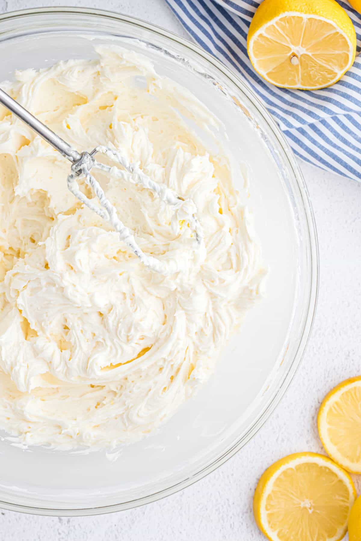 Lemon buttercream frosting whipped to a fluffy texture.
