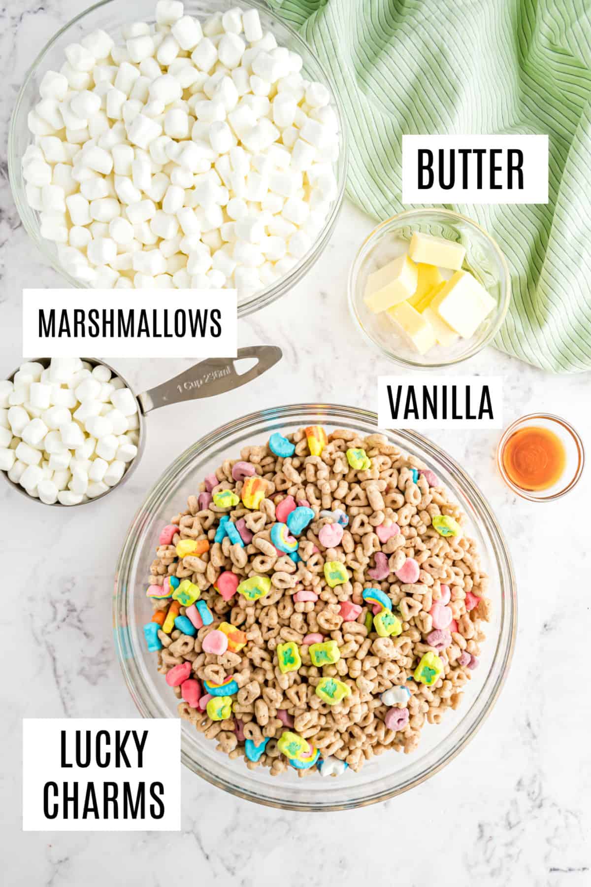 Four ingredients needed for Lucky Charms treat bars.