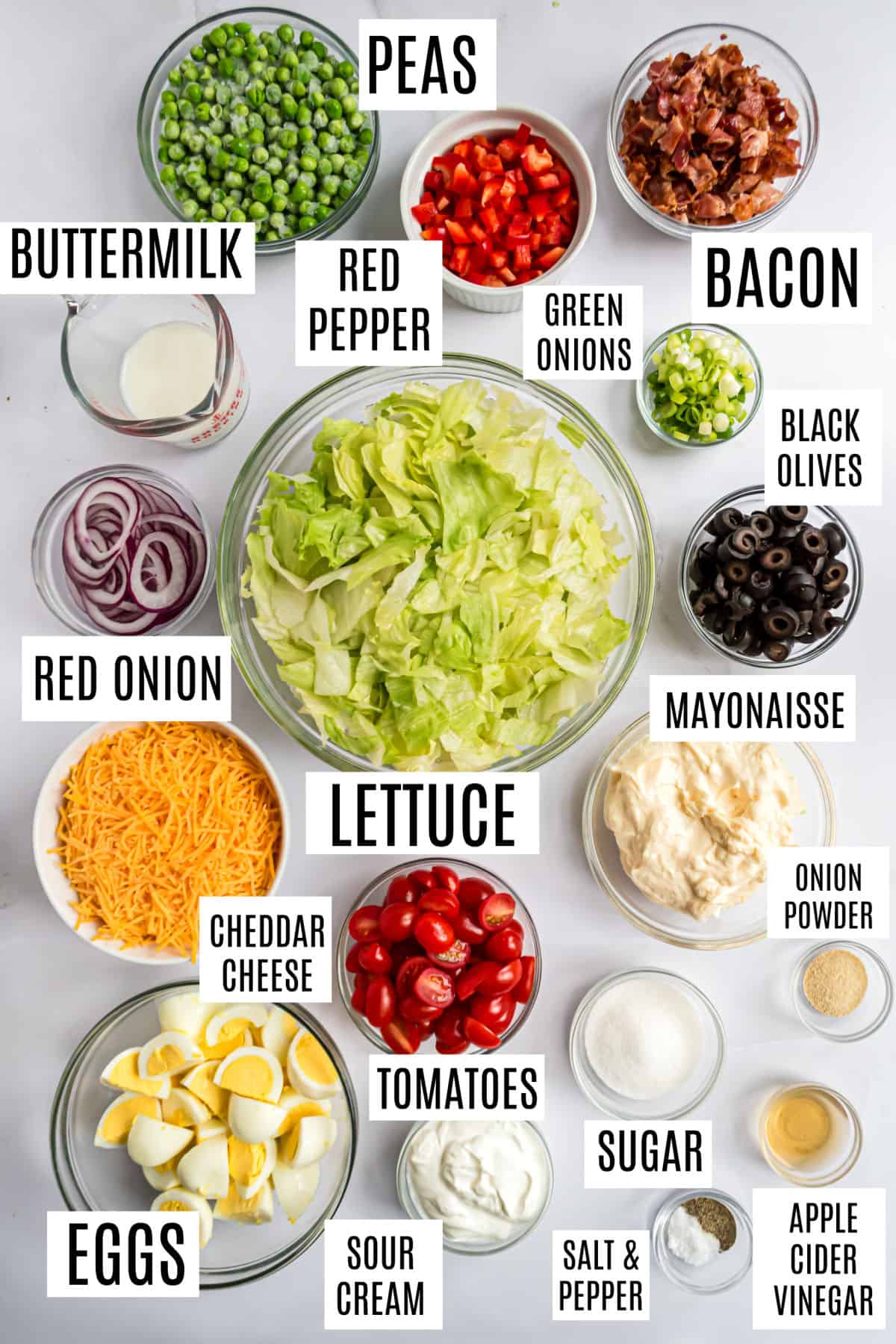 Ingredients needed to make 7 layer salad.