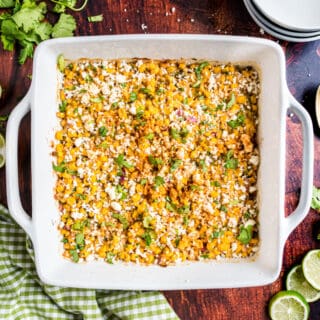 Mexican street corn salad baked in a square dish.