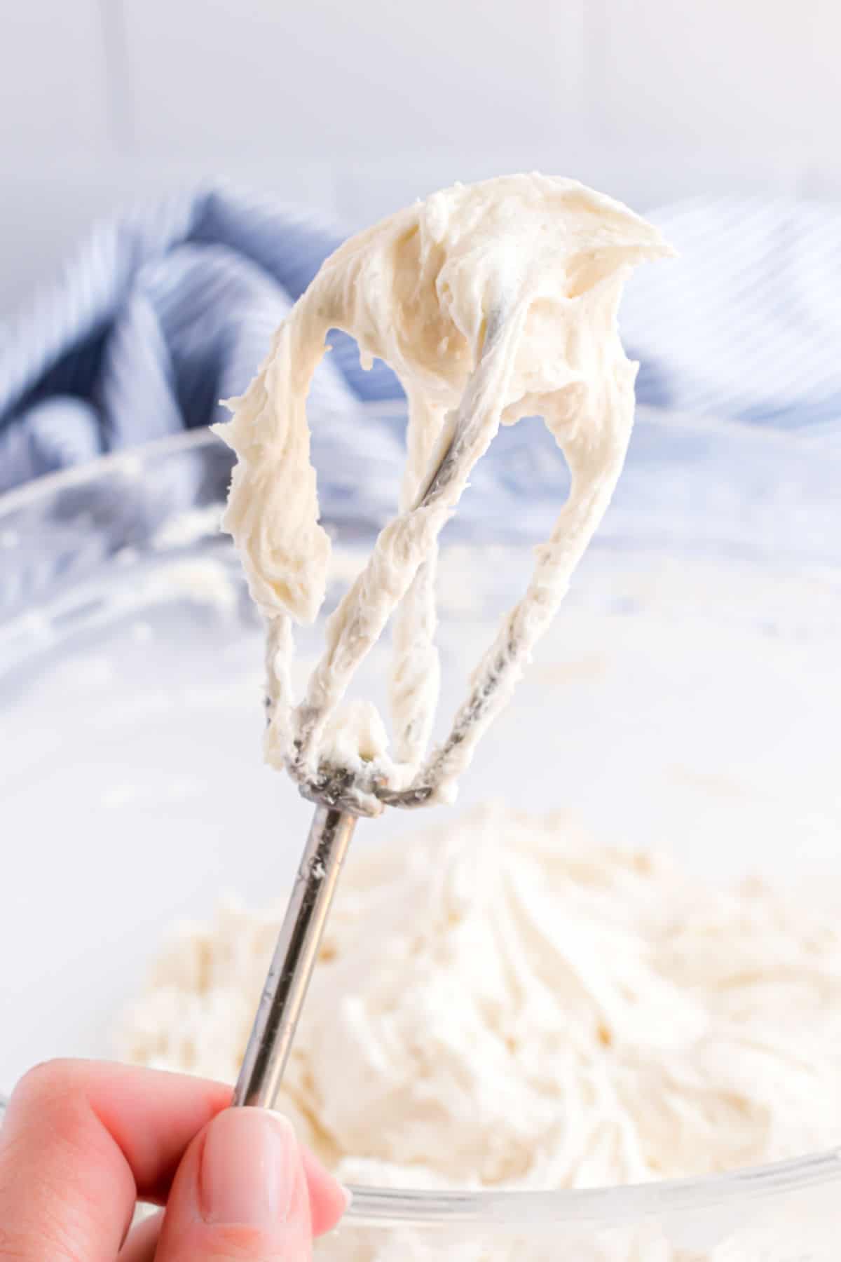 Vanilla frosting on an electric beater.