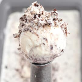 Oreo ice cream scoop on a metal scooper.