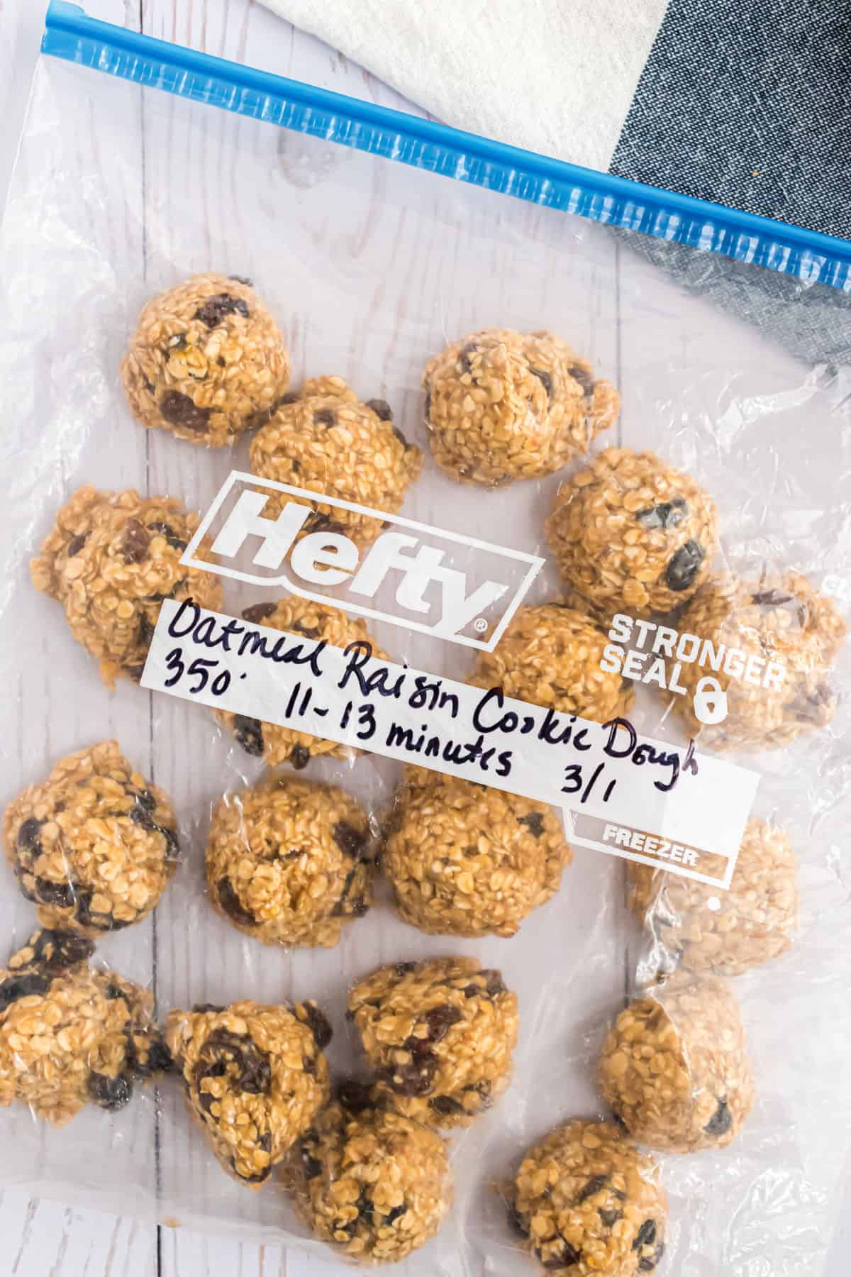 Oatmeal raisin cookie dough in freezer safe ziploc bag.