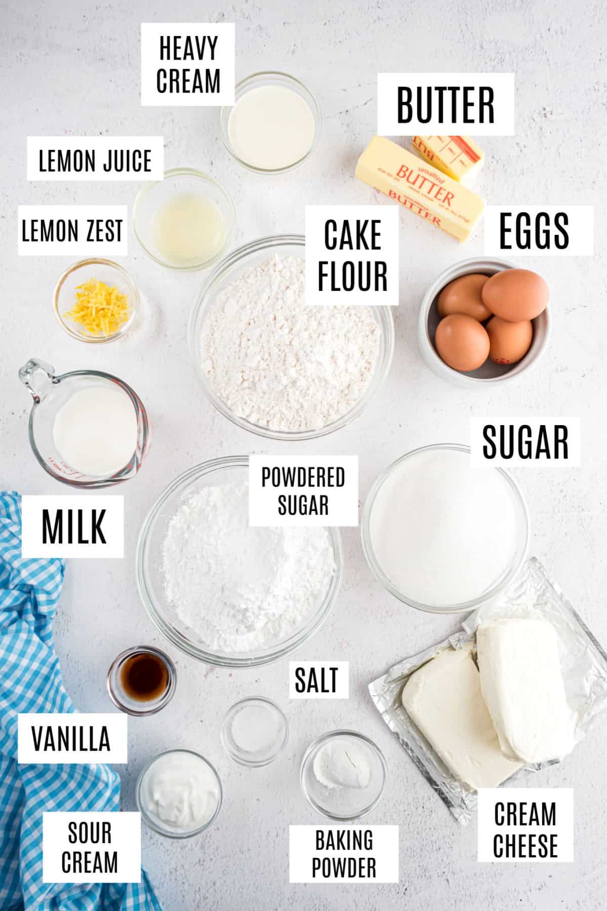 Ingredients needed for lemon cheesecake cake.