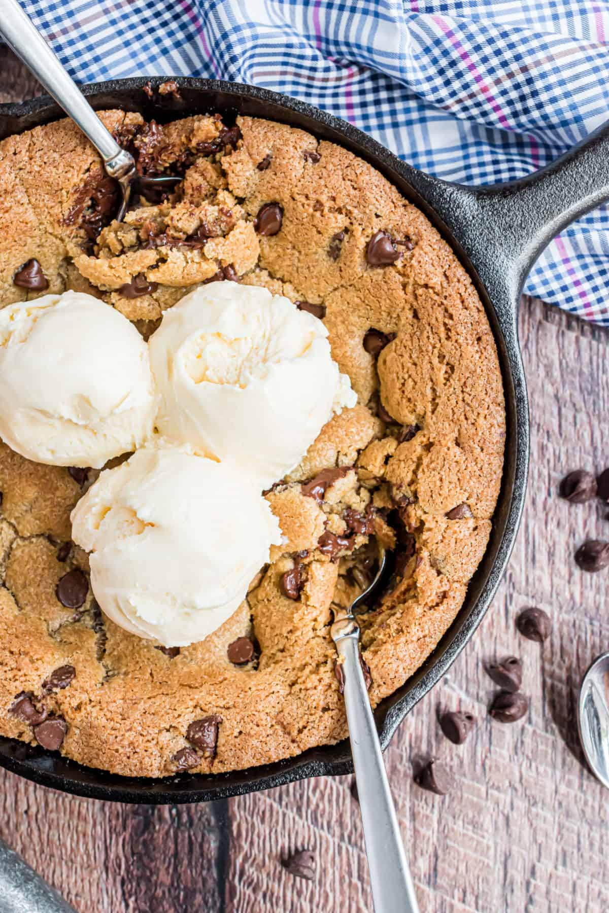 Chocolate chip cookie baked in a skillet and topped with vanilla ice cream.