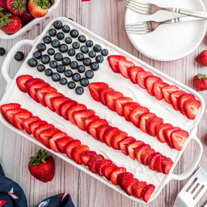 Celebrate Independence Day with this eye catching Flag Cake. Whipped cream and fresh berries make this stars-and-stripes dessert a crowd pleaser. Let this cake be the sweet finish for your Fourth of July meal!