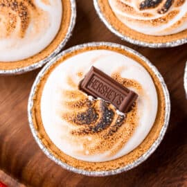 S'mores Pie topped with marshmallow and chocolate bar.