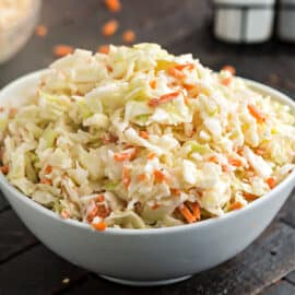 Make copycat KFC Coleslaw that's better than the original! Everyone's favorite fried chicken side dish is easy to replicate at home. This fresh coleslaw has a tangy buttermilk dressing that keeps you coming back for more.